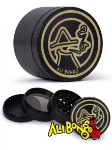 a black 63mm metal herb grinder with a gold Ali Bongo on the top 